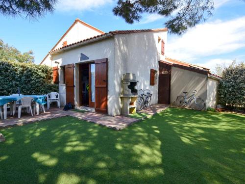 Maison 30m² avec Piscine, Tennis, Terrasse et Jardin - 6 pers, proche Plage et Zoo La Palmyre - FR-1-705-42 gîte à louer La Palmyre