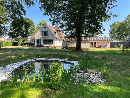 B&B Schneverdingen - Kleine Villa Marleen, Ferienwohnung - Bed and Breakfast Schneverdingen