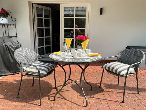 ระเบียง/ชานเรือน, Kleine Villa Marleen, Ferienwohnung in ชเนเฟอร์ดินเกน