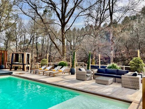 Villa piscine spa entre forêt et rivières gîte à louer Biganon