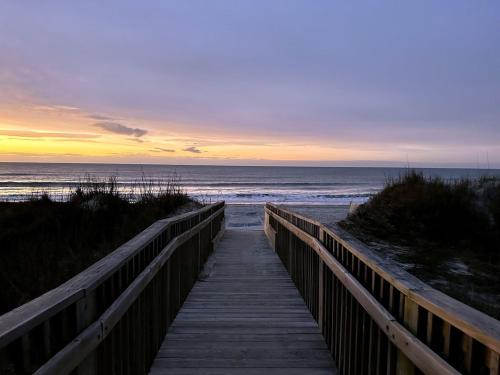 OCEAN VIEW condo with POOL steps from the beach! Your Driftwood Oasis awaits!