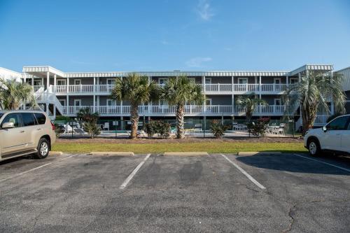 OCEAN VIEW condo with POOL steps from the beach! Your Driftwood Oasis awaits!