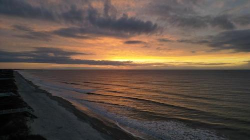 OCEAN VIEW condo with POOL steps from the beach! Your Driftwood Oasis awaits!