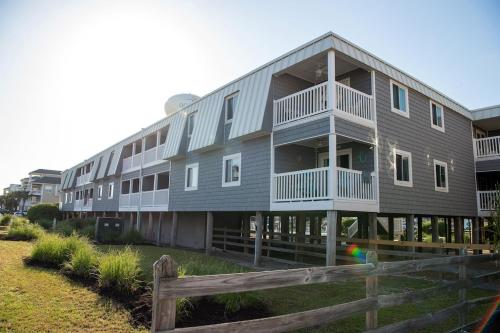 OCEAN VIEW condo with POOL steps from the beach! Your Driftwood Oasis awaits!