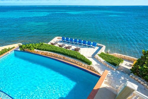 Cayman Castle by Grand Cayman Villas & Condos in East End