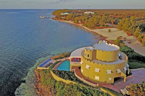 Cayman Castle by Grand Cayman Villas & Condos