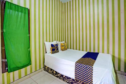 SPOT ON 92673 Gang Songo Syariah Homestay