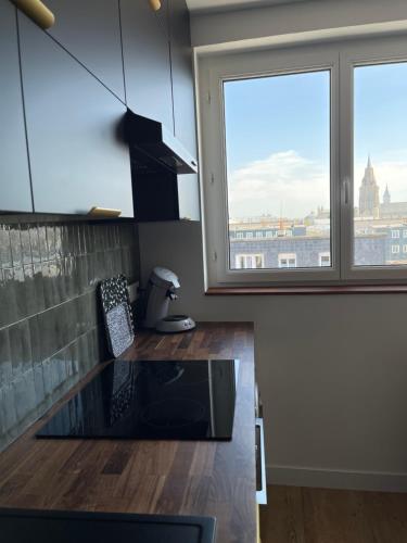 Cocina, TheLighthouse Logement cozy idéalement situé (TheLighthouse Logement cozy idealement situe) in Calais City Center