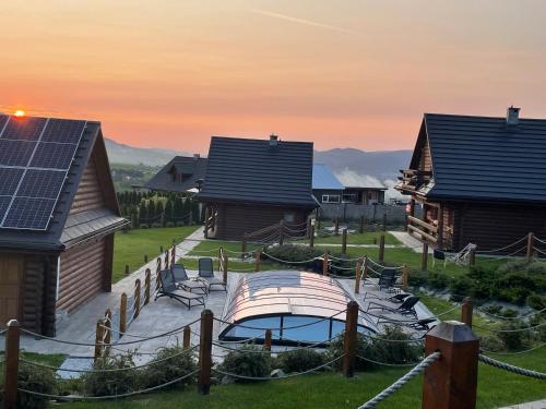 Domki Zagroda Domek z bala z basenem & sauna & balia z hydromasażem