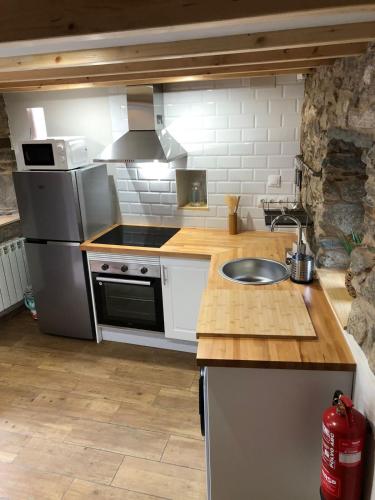 virtuve, Apartamentos El Arroyo in Boal