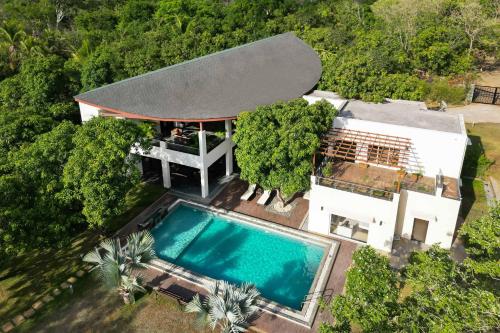 The Leaf by StayVista - An enchanting escape offering a pool, terrace, lush lawn, contemporary interiors, and indoor games, Alibag