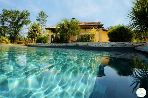 Villa avec Piscine Parentis en Born 13 personnes - Location, gîte - Parentis-en-Born