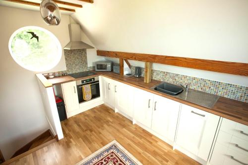 Topsy-Turvy, Gardeners Cottage, Clungunford, Ludlow, Shropshire SY70PN