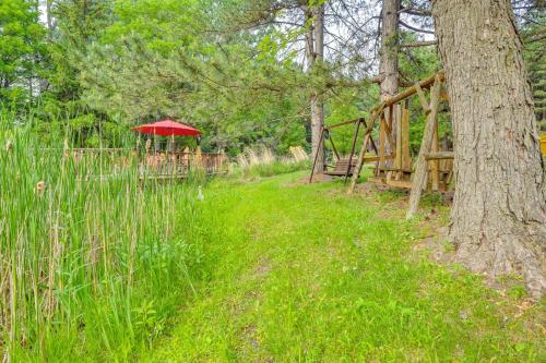 Magical Metamora Cottage with Fire Pit, Pond, Deck!