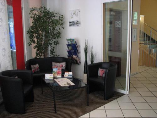 Фойє, 1, 2, sleep Boardinghouse Unterschleißheim Zentrum in Unterschleissheim