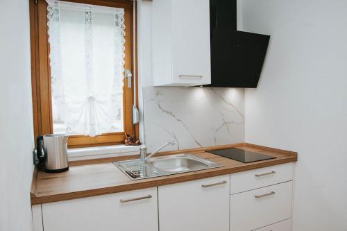 Apartmaji URŠIČ (Apartmaji URSIC) in 科巴里德 