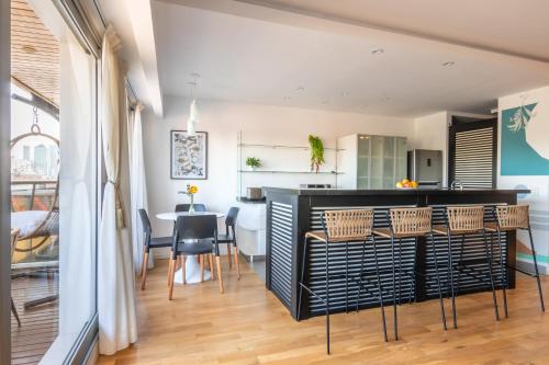 Kitchen, Family Apartment with Puente de la Mujer View in Puerto Madero in Puerto Madero