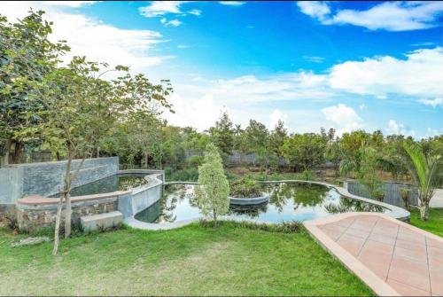 Swimming pool, Apple Farmhouse Entire 3 BHK with a Pool in Sohna