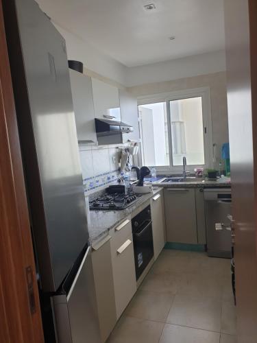 Cocina, Luxueux appartement front mer in Sidi Rahal