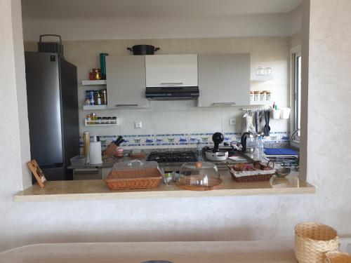 Cocina, Luxueux appartement front mer in Sidi Rahal