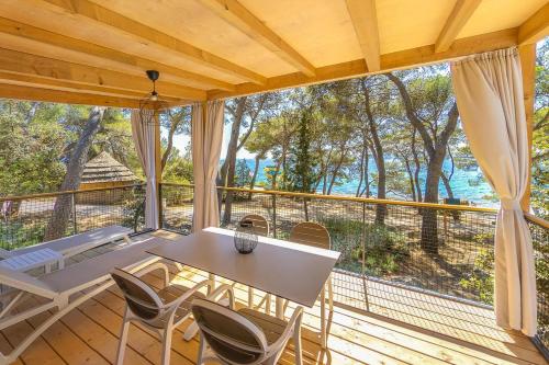 Premium Two-Bedroom Glamping Home with Terrace and Sea View  room in Pine Beach Mobile homes all inclusive