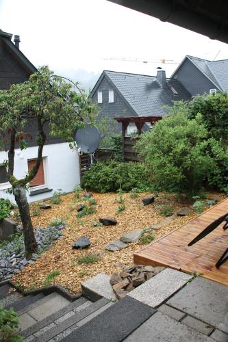 สวน, Ferienhaus Winterberg für 12 Personen Sauna Garten Garage Hund (Ferienhaus Winterberg fur 12 Personen Sauna Garten Garage Hund) in ซิลบัค