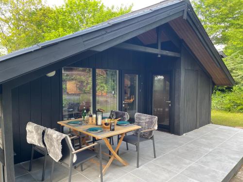 Балкон, Ferienhaus Kleine Auszeit in der Natur mit Kamin, Yogamatten, schöne Küche (Ferienhaus Kleine Auszeit in der Natur mit Kamin, Yogamatten, schone Kuche) in Extertal