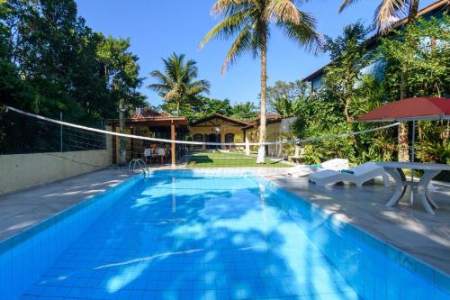 Casa com piscina aquecida a 100m da praia Maresias – khách sạn tại Maresias
