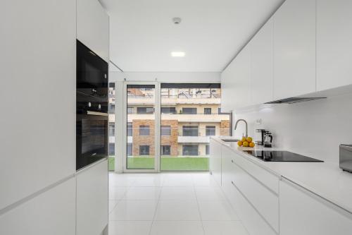 WHome Urban Retreat w/Parking, Elevator & AC by Benfica Stadium