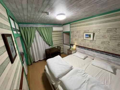 미야코지마 宮古島ゲストハウス　マウイ (宮古島ゲストハウス　マウイ) 2성급 호텔 스위트룸