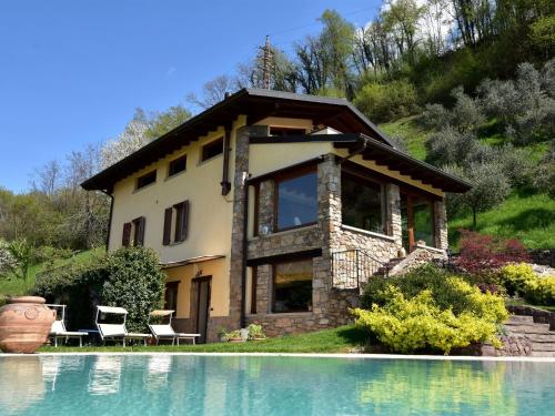 Villa in Pisogne with pool garden and lake view