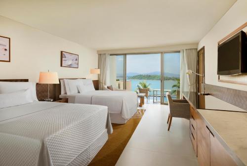 Deluxe, Guest room, 2 Double, Sea view, Pool access