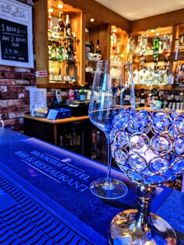 Brookside Hotel & Residents Bar , Cozy lounge areas & Terrace ,Suitable for Solo Travelers Couples Educational Groups Families & Contractors welcome 5