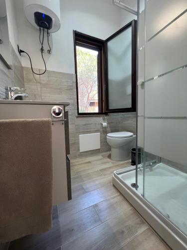 Baño, Tommy's House Pinus Village Chia in Santa Margherita di Pula