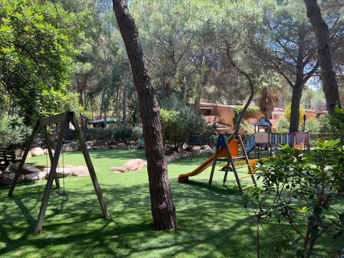 Parque infantil, Tommy's House Pinus Village Chia in Santa Margherita di Pula