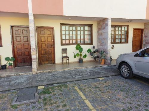 Casa de 2 Suítes com Internet Rápida e Comodidades