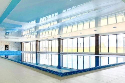 Apartment by Dziwna River with Pool Access, Dziwnów (foto 2)