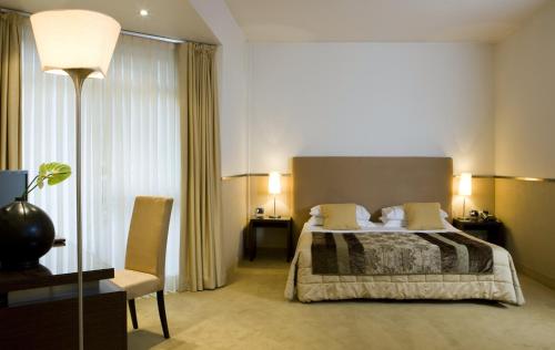 Mini Palace Hotel The 4-star Mini Palace Hotel offers comfort and convenience whether youre on business or holiday in Viterbo. Offering a variety of facilities and services, the hotel provides all you need for a good 