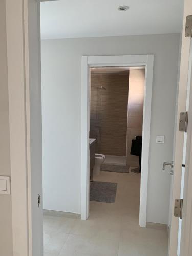 Penthouse with wide terrace next to the ocean