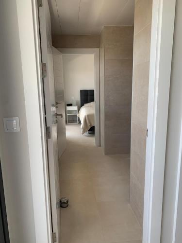 Penthouse with wide terrace next to the ocean