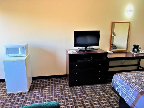 Designer Inn and Suites