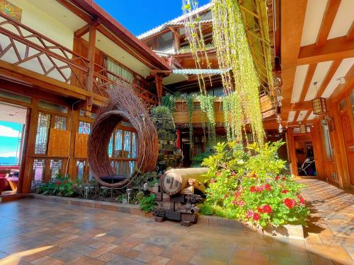 Сад, Frida's Inn 丽江梦之旅观景客栈 in Лицзян