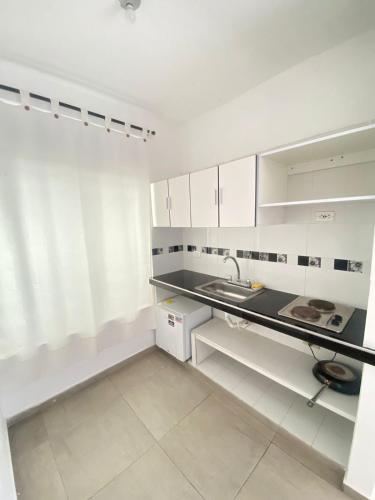 Kitchen, HOTEL EBENEZER in Villavicencio