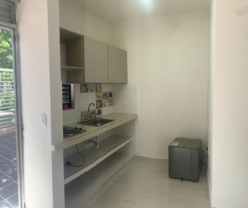 Kitchen, HOTEL EBENEZER in Villavicencio