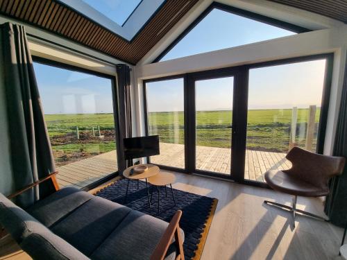 Koplietošanas atpūtas telpa ar TV, Arctic Exclusive Ranch in Grafarkirkja