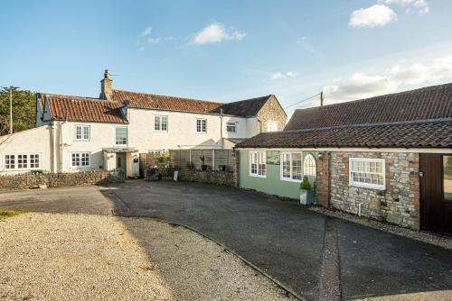 The Farmhouse with two hot tubs in Siston