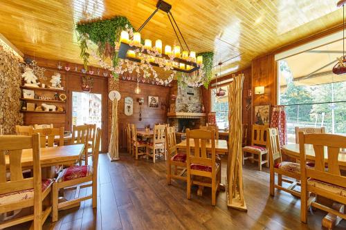 مطعم, Apartaments La Neu-Mountain Lodges & Restaurant in لورتس