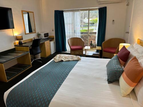 แกรนด์ คันทรี ลอดจ์ โมเต็ล (Grand Country Lodge Motel) in มิตตากอง