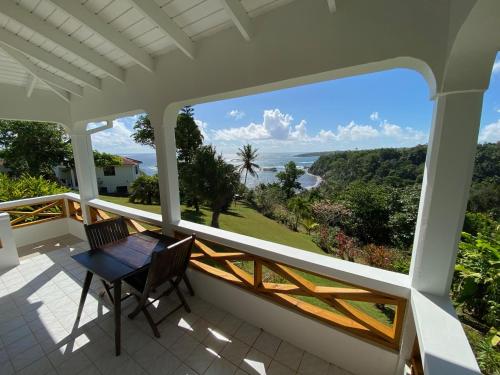 Sea Cliff Eco-Cottages & Gin Distillery in Calibishie