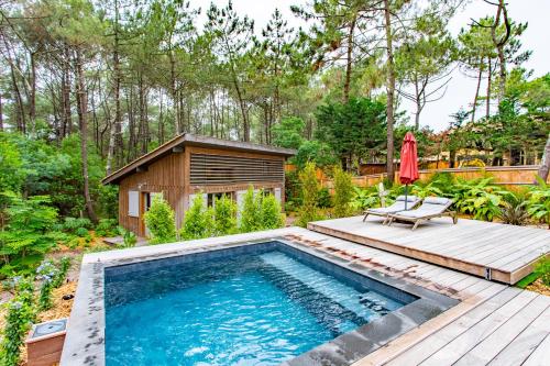 Charmante maison en bois avec piscine dans les pins à la pointe - Location saisonnière - Lège-Cap-Ferret